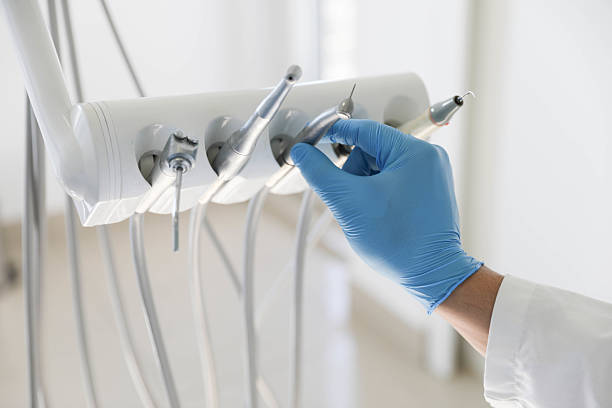 Professional Emergency Dentist technician working in Providence, KY